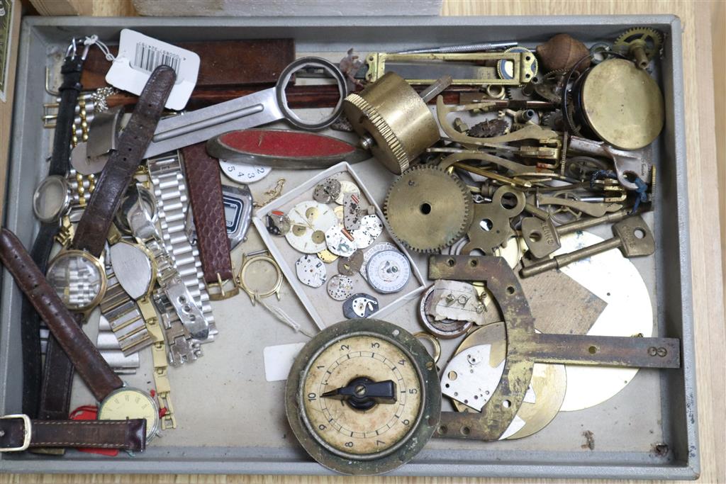 A quantity of mixed clock and watch parts including dials and glasses